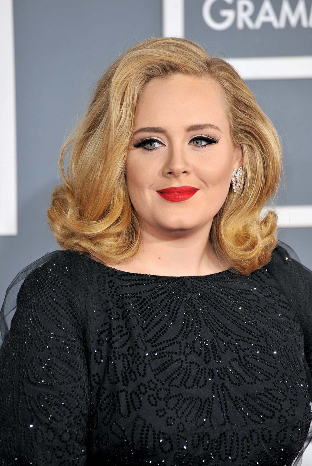 Adele reaparece con veinte kilos de menos