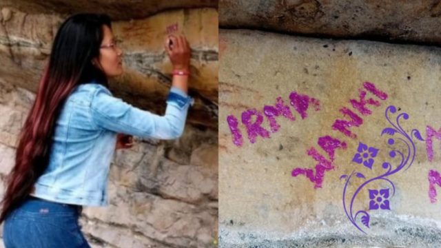 Mujer raya su nombre en pinturas rupestres