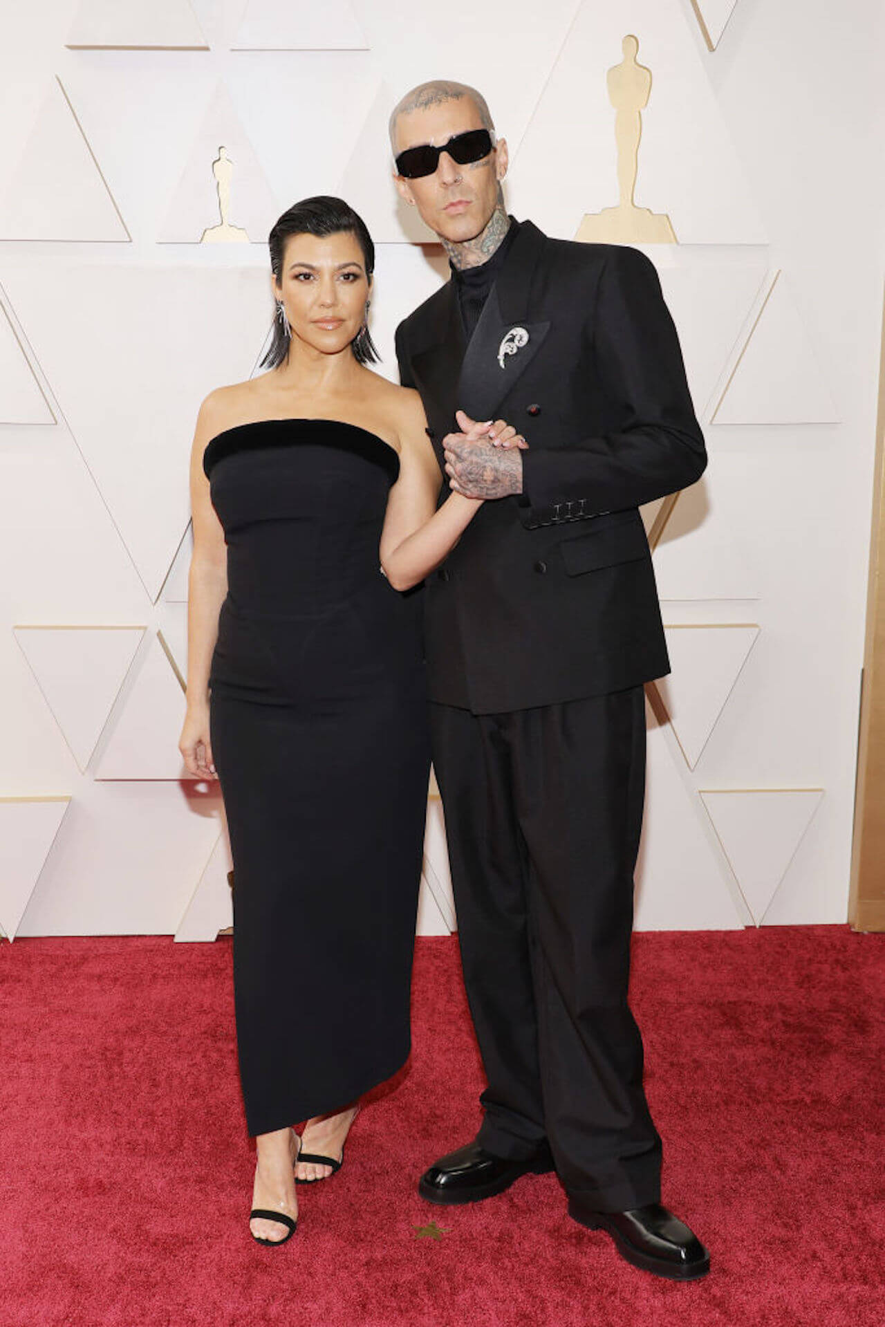 Kourtney Kardashian y Travis Barker en los premios Oscar 2022
