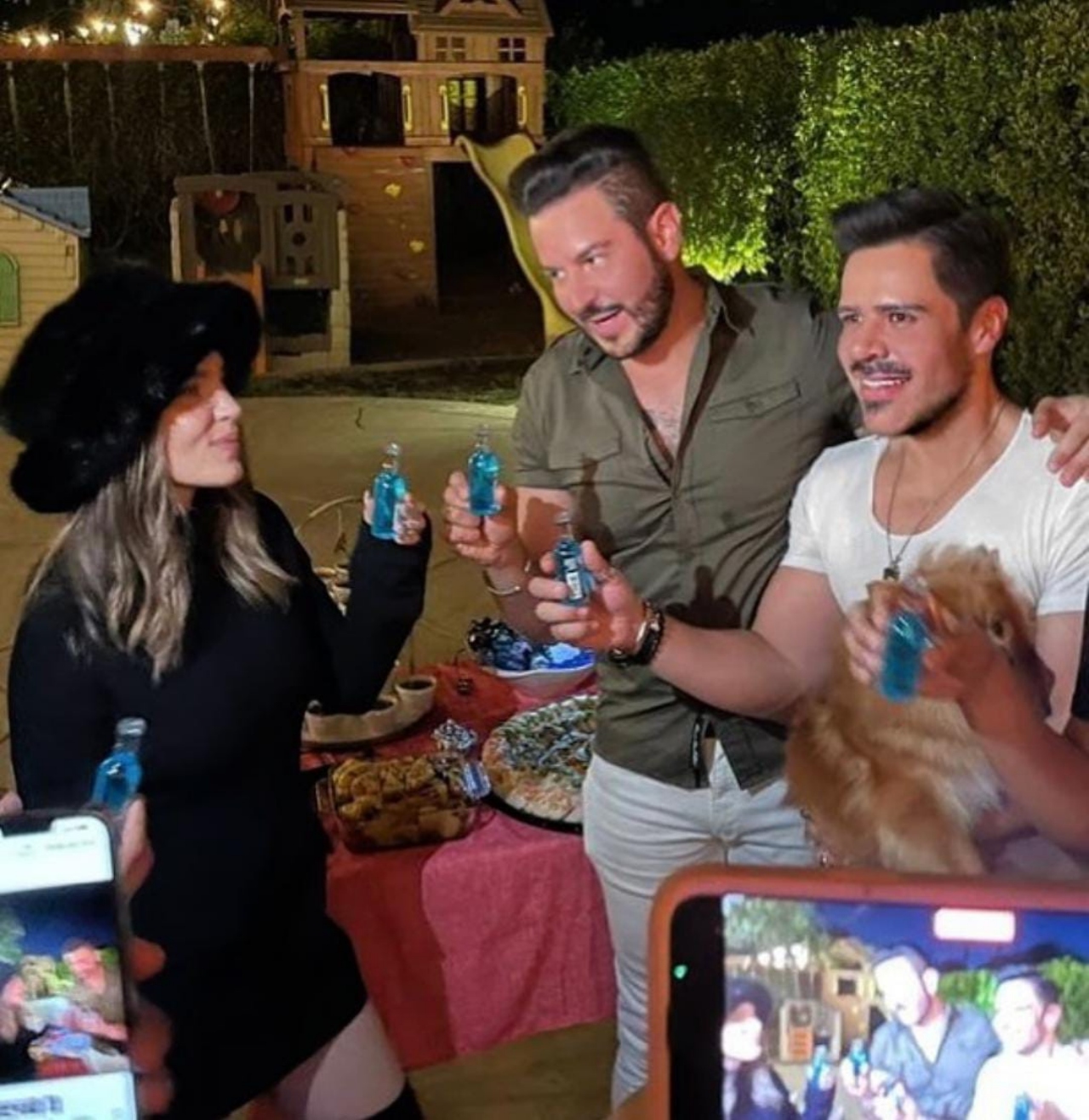 Belinda festejando con la pareja